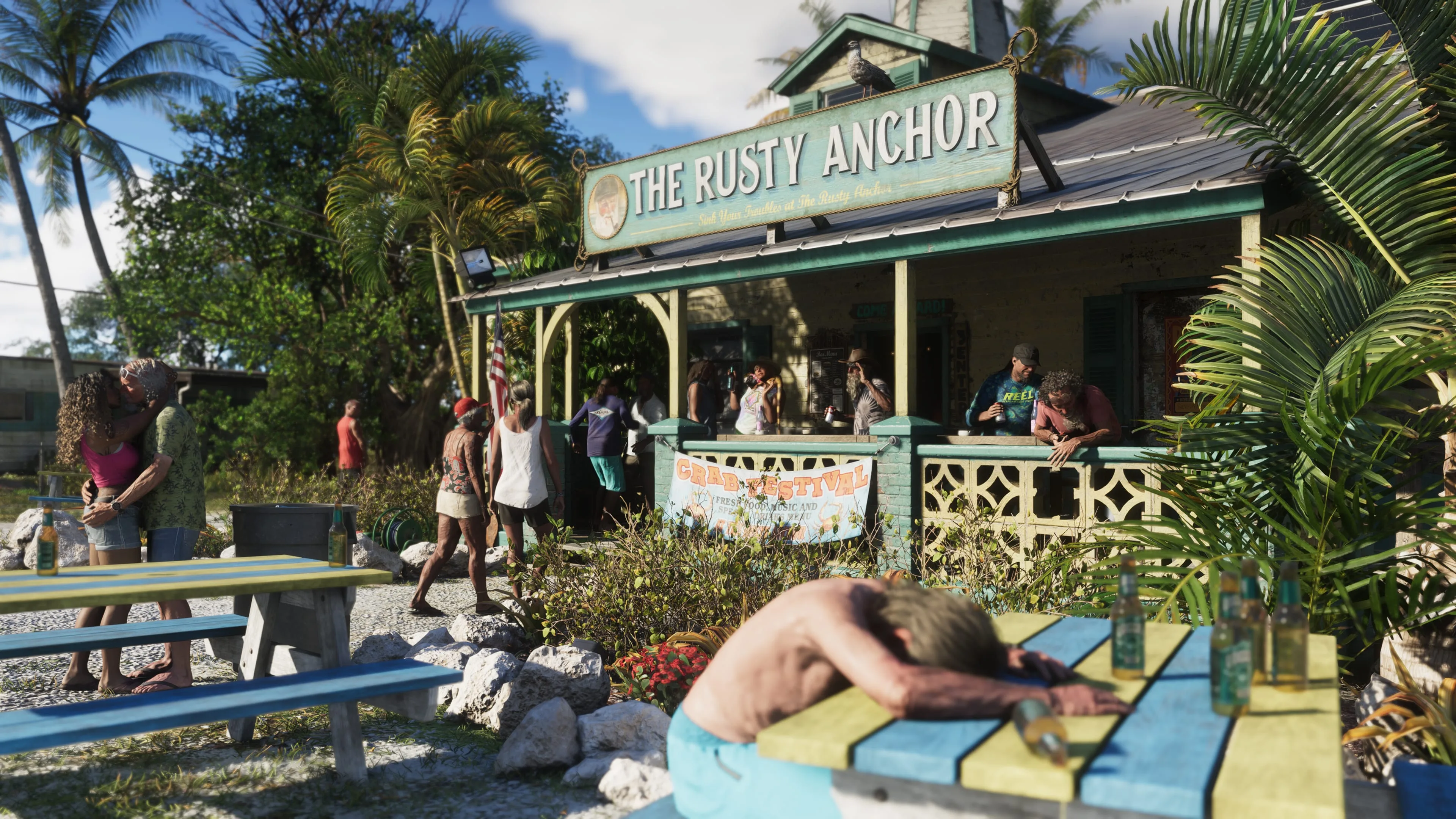 Official 'The Rusty Anchor' Leonida Keys screenshot via Rockstar Games' GTA VI media gallery, showing the kind of foliage and crowd density a GPU will have to render.